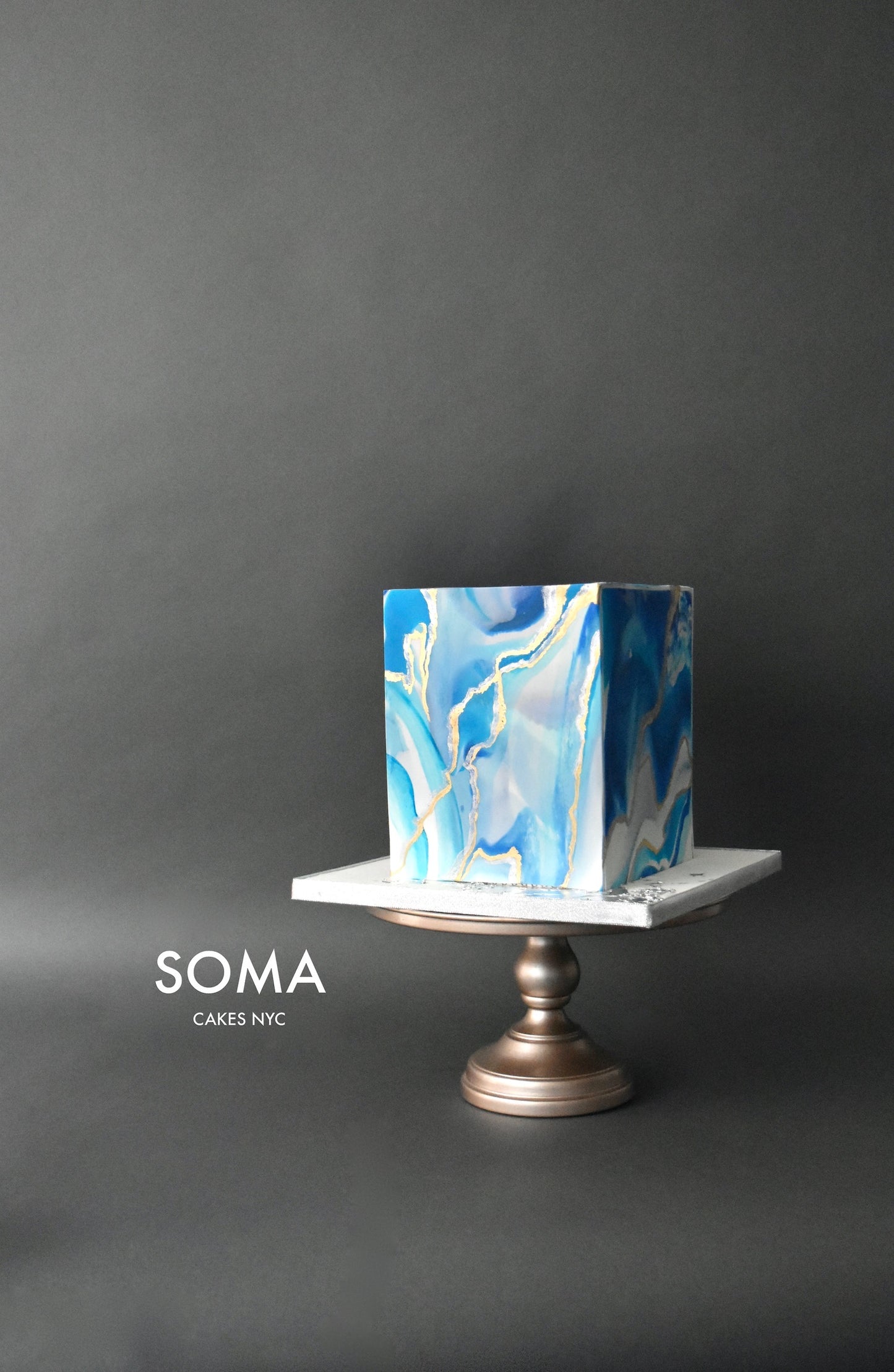 Blue Marble with Gold and Silver Streaks